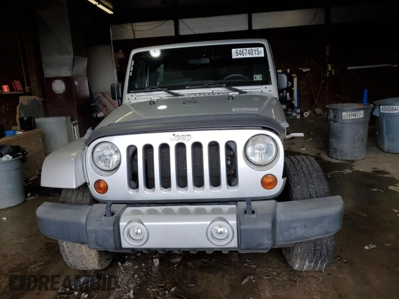 2012 Jeep Wrangler Arctic z VIN 1C4GJWBG2CL237343, wystawiony jako Copart lot #64674015 z przebiegiem 72 750 mil mil oraz Szkoda całkowita • Salvage title. Historia ofert i sprzedaży dostępna na DreamBid. Obrazek 5.