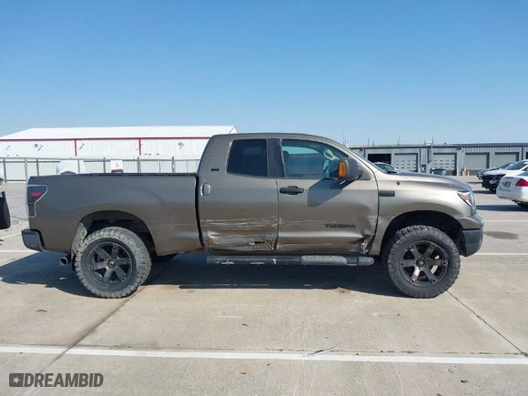 2010 Toyota Tundra 4WD Truck with VIN 5TFUY5F14AX140360, listed as a IAAI auction lot 41790725 with 160,447 mi miles. Bid and sale history available at carsss.com. Image 13.