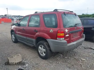 2001 Ford Escape with VIN 1FMCU01121KE83520, listed as a IAAI auction lot 42578099 with 279,085 mi miles and . Bid and sale history available at DreamBid. Image 3.