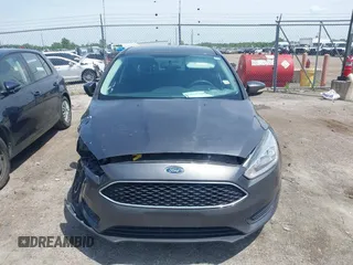 2017 Ford Focus SE with VIN 1FADP3F2XHL235013, listed as a IAAI auction lot 42370565 with 112,276 mi miles and . Bid and sale history available at DreamBid. Image 12.