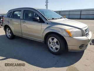 2009 Dodge Caliber SXT z VIN 1B3HB48A19D199410, wystawiony jako Copart lot #55133965 z przebiegiem 141 658 mil mil oraz Szkoda całkowita • Salvage title. Historia ofert i sprzedaży dostępna na DreamBid. Obrazek 4.