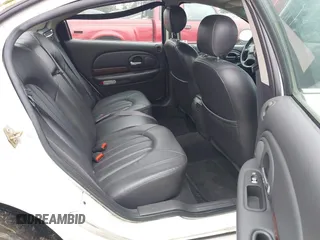 2000 Chrysler LHS with VIN 2C3HC56G4YH382301, listed as a IAAI auction lot 41324699 with 220,076 mi miles and . Bid and sale history available at DreamBid. Image 8.