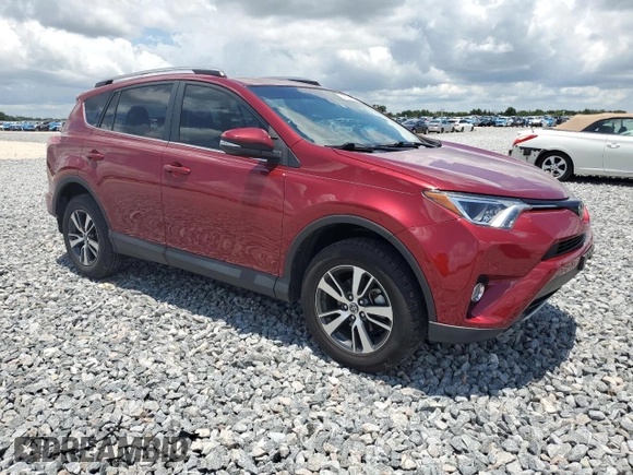 2018 Toyota RAV4 XLE with VIN 2T3WFREV7JW477541, listed as a Copart auction lot 64756575 with 59,779 mi miles and Salvage title. Bid and sale history available at DreamBid. Image 4.