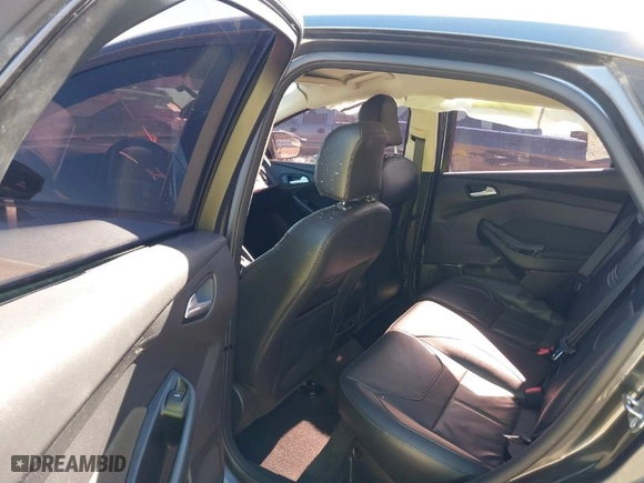 2015 Ford Focus SE with VIN 1FADP3F22FL264972, listed as a IAAI auction lot 41674698 with 117,376 mi miles. Bid and sale history available at carsss.com. Image 8.