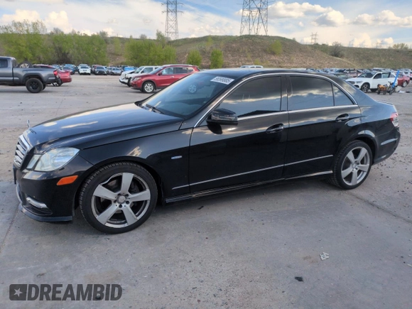 2012 Mercedes-Benz E 350 Luxury z VIN WDDHF5KB0CA590301, wystawiony jako Copart lot #56599885 z przebiegiem 115 802 mil mil oraz Szkoda całkowita • Salvage title. Historia ofert i sprzedaży dostępna na DreamBid. Obrazek 1.