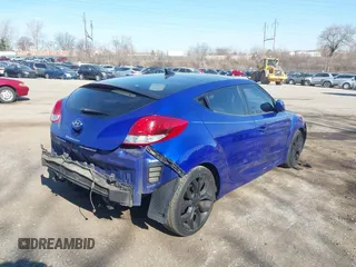2012 Hyundai Veloster w/Black Int z VIN KMHTC6AD9CU046041, wystawiony jako IAAI lot #41772806 z przebiegiem 110 098 mil mil oraz . Historia ofert i sprzedaży dostępna na DreamBid. Obrazek 6.