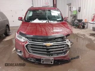 2021 Chevrolet Traverse LT Cloth with VIN 1GNEVGKW8MJ124350, listed as a IAAI auction lot 41456704 with 121,336 mi miles. Bid and sale history available at carsss.com. Image 12.