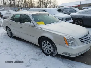 2009 Cadillac DTS w/1SA with VIN 1G6KD57Y69U125633, listed as a IAAI auction lot 41332008 with 171,086 mi miles. Bid and sale history available at carsss.com. Image 1.