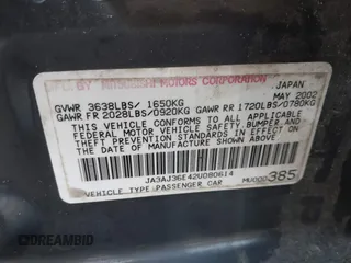 2002 Mitsubishi Lancer LS with VIN JA3AJ36E42U080614, listed as a IAAI auction lot 41397554 with 187,981 mi miles. Bid and sale history available at carsss.com. Image 9.