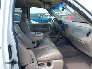 2003 Ford F-150 XL with VIN 1FTRX17L33NB79733, listed as a IAAI auction lot 42023385 with 136,236 mi miles. Bid and sale history available at carsss.com. Image 5.