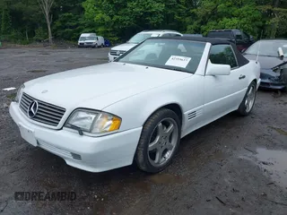 1991 Mercedes-Benz 500 z VIN WDBFA66E9MF020617, wystawiony jako IAAI lot #42355637 z przebiegiem 93 104 mil mil oraz . Historia ofert i sprzedaży dostępna na DreamBid. Obrazek 2.