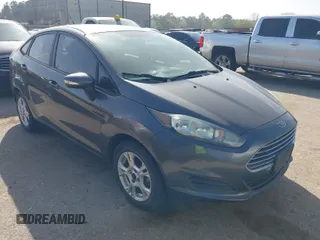 2016 Ford Fiesta SE z VIN 3FADP4BJ1GM143160, wystawiony jako IAAI lot #41789400 z przebiegiem 96 908 mil mil oraz . Historia ofert i sprzedaży dostępna na DreamBid. Obrazek 1.