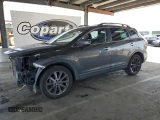 2015 Mazda CX-9 Grand Touring z VIN JM3TB3DV2F0456130, wystawiony jako Copart lot #55787935 z przebiegiem 120 888 mil mil oraz Szkoda całkowita • Salvage title. Historia ofert i sprzedaży dostępna na DreamBid. Obrazek 1.