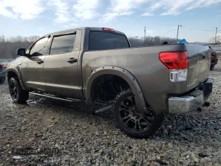 2010 Toyota Tundra z VIN 5TFDW5F13AX147077, wystawiony jako Copart lot #43742785 z przebiegiem 242 569 mil mil oraz Szkoda całkowita • Salvage title. Historia ofert i sprzedaży dostępna na DreamBid. Obrazek 2.