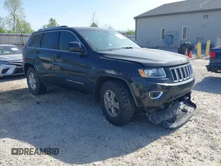 2014 Jeep Grand Cherokee Laredo with VIN 1C4RJEAG0EC442053, listed as a IAAI auction lot 42098601 with 200,982 mi miles and . Bid and sale history available at DreamBid. Image 1.