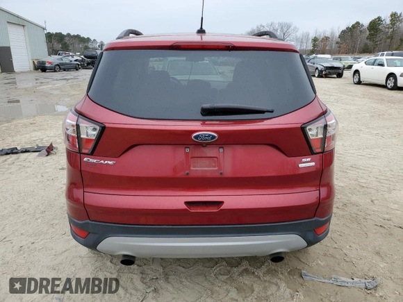 2018 Ford Escape SE with VIN 1FMCU0G9XJUB62780, listed as a Copart auction lot 88091125 with 75,511 mi miles and Salvage Title. Bid and sale history available at carsss.com. Image 6.