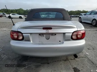 2003 Mazda MX-5 Miata Cloth z VIN JM1NB353630305964, wystawiony jako Copart lot #58517505 z przebiegiem 129 675 mil mil oraz Szkoda całkowita • Salvage title. Historia ofert i sprzedaży dostępna na DreamBid. Obrazek 6.