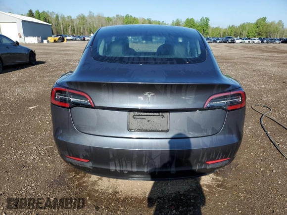 2023 Tesla Model 3 z VIN 5YJ3E1EAXPF404814, wystawiony jako Copart lot #56857105 z przebiegiem 59 360 mil mil oraz Czysty tytuł • Clean title. Historia ofert i sprzedaży dostępna na DreamBid. Obrazek 6.