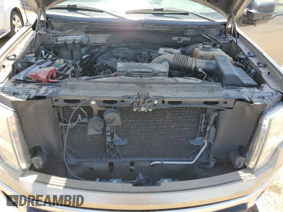2011 Ford F-150 XL with VIN 1FTEX1CMXBKE18319, listed as a Copart auction lot 56668365 with 111,598 mi miles and Salvage title. Bid and sale history available at DreamBid. Image 11.