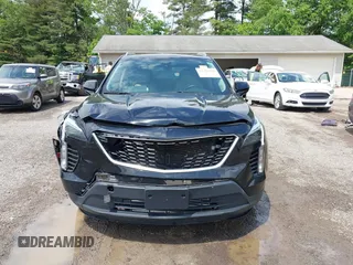 2019 Cadillac XT4 AWD Luxury z VIN 1GYFZBR41KF150209, wystawiony jako IAAI lot #42325529 z przebiegiem 76 828 mil mil oraz . Historia ofert i sprzedaży dostępna na DreamBid. Obrazek 12.