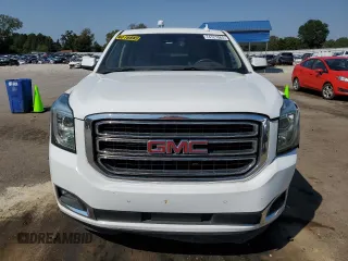 2019 GMC Yukon XL SLT with VIN 1GKS1GKCXKR239712, listed as a Copart auction lot 74721584 with 143,690 mi miles and Salvage Title. Bid and sale history available at carsss.com. Image 5.