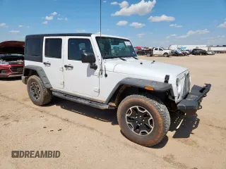 2012 Jeep Wrangler Unlimited Sport with VIN 1C4BJWDG9CL187421, listed as a Copart auction lot 61411145 with 140,390 mi miles and Clean title. Bid and sale history available at DreamBid. Image 4.