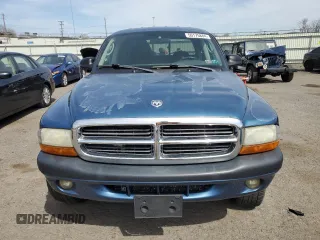2004 Dodge Dakota Sport z VIN 1D7HG38N74S590407, wystawiony jako Copart lot #50175884 z przebiegiem 160 959 mil mil oraz Czysty tytuł • Clean title. Historia ofert i sprzedaży dostępna na DreamBid. Obrazek 5.