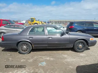 2007 Ford Police Interceptor z VIN 2FAFP71W97X155407, wystawiony jako IAAI lot #41881583 z przebiegiem Nie podano mil oraz . Historia ofert i sprzedaży dostępna na DreamBid. Obrazek 13.