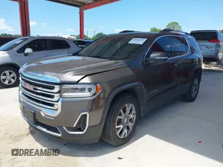 2020 GMC Acadia SLT with VIN 1GKKNULS1LZ106637, listed as a IAAI auction lot 42048333 with 129,491 mi miles and . Bid and sale history available at carsss.com. Image 2.