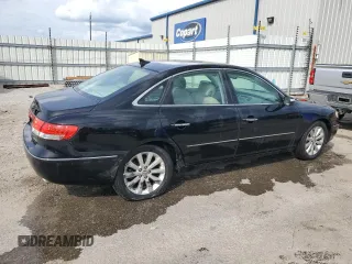 2009 Hyundai Azera Limited z VIN KMHFC46F29A341228, wystawiony jako Copart lot #55204355 z przebiegiem 156 251 mil mil oraz Szkoda całkowita • Salvage title. Historia ofert i sprzedaży dostępna na DreamBid. Obrazek 3.