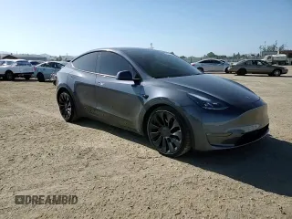 2022 Tesla Model Y Performance with VIN 7SAYGDEFXNF521502, listed as a Copart auction lot 56132745 with 73,339 mi miles and Salvage title. Bid and sale history available at DreamBid. Image 14.