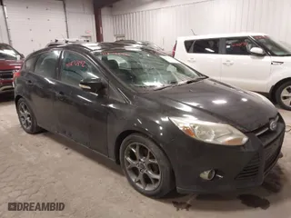 2014 Ford Focus SE with VIN 1FADP3K26EL337345, listed as a IAAI auction lot 41872892 with 169,472 mi miles. Bid and sale history available at carsss.com. Image 1.