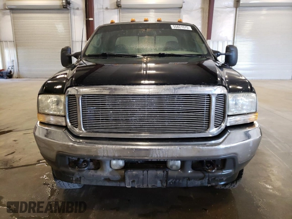2002 Ford F-350 XL with VIN 1FTSW31F92EC17984, listed as a Copart auction lot 55821575 with 346,645 mi miles and Salvage title. Bid and sale history available at DreamBid. Image 5.