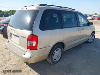2001 Mazda MPV DX with VIN JM3LW28G710206403, listed as a IAAI auction lot 41973136 with 143,686 mi miles. Bid and sale history available at carsss.com. Image 4.