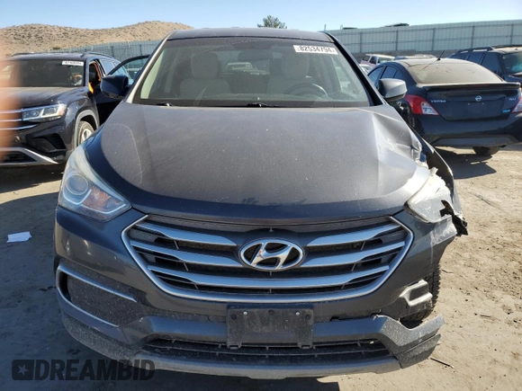 2018 Hyundai Santa Fe 2.4L z VIN 5XYZTDLB5JG568579, wystawiony jako Copart lot #82534794 z przebiegiem 130 032 mil mil oraz Szkoda całkowita • Salvage title. Historia ofert i sprzedaży dostępna na DreamBid. Obrazek 5.