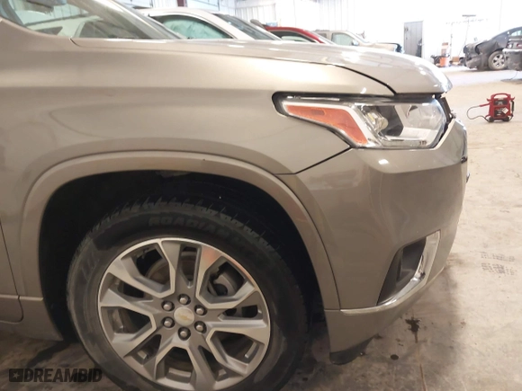 2018 Chevrolet Traverse Premier with VIN 1GNEVJKW0JJ165144, listed as a IAAI auction lot 41129951 with 137,593 mi miles. Bid and sale history available at carsss.com. Image 18.
