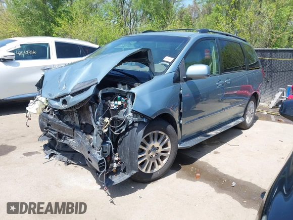 2009 Toyota Sienna XLE with VIN 5TDZK22C99S239755, listed as a IAAI auction lot 42096411 with 214,983 mi miles. Bid and sale history available at carsss.com. Image 2.