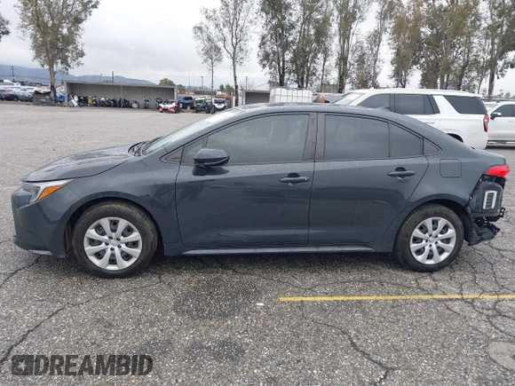 2023 Toyota Corolla Hybrid LE with VIN JTDBCMFE3P3020309, listed as a IAAI auction lot 41785944 with 19,617 mi miles. Bid and sale history available at carsss.com. Image 15.