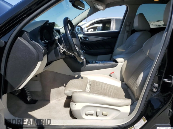 2014 Infiniti Q50 Premium with VIN JN1BV7ARXEM687605, listed as a Copart auction lot 61275535 with 104,337 mi miles and Salvage title. Bid and sale history available at DreamBid. Image 7.