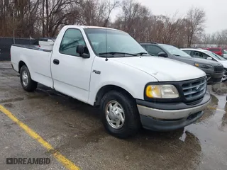 1999 Ford F-150 Work Series with VIN 1FTZF1725XKB01679, listed as a IAAI auction lot 41715160 with 233,228 mi miles. Bid and sale history available at carsss.com. Image 1.
