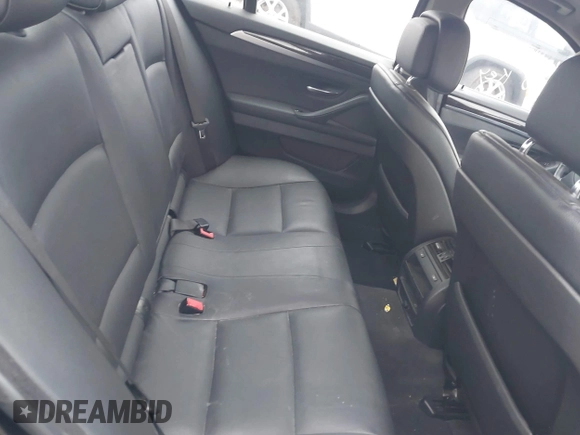 2013 BMW 5 Series 528i xDrive with VIN WBAXH5C59DDW15444, listed as a IAAI auction lot 40818314 with 114,901 mi miles and . Bid and sale history available at DreamBid. Image 8.