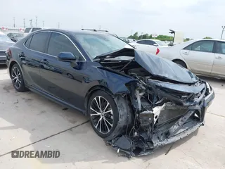 2019 Toyota Camry LE z VIN 4T1B11HK6KU847260, wystawiony jako IAAI lot #42040866 z przebiegiem 57 623 mil mil oraz . Historia ofert i sprzedaży dostępna na DreamBid. Obrazek 1.