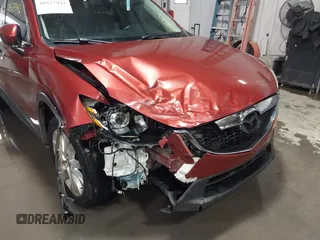 2013 Mazda CX-5 Grand Touring with VIN JM3KE2DE3D0120609, listed as a IAAI auction lot 41527942 with 215,176 mi miles. Bid and sale history available at carsss.com. Image 6.