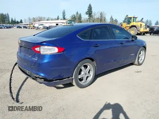 2014 Ford Fusion SE Hybrid with VIN 3FA6P0LU7ER293753, listed as a IAAI auction lot 41968592 with 173,895 mi miles and . Bid and sale history available at DreamBid. Image 4.