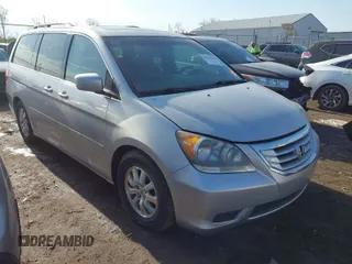2010 Honda Odyssey EX-L with VIN 5FNRL3H68AB007631, listed as a IAAI auction lot 42064445 with 203,361 mi miles. Bid and sale history available at carsss.com. Image 1.