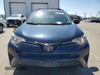 2017 Toyota RAV4 LE with VIN JTMBFREVXHJ700923, listed as a Copart auction lot 52887645 with 119,528 mi miles and Salvage title. Bid and sale history available at DreamBid. Image 5.