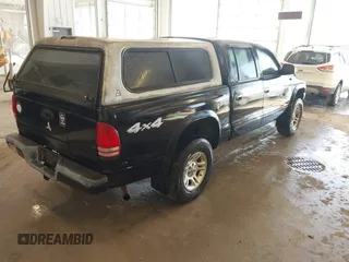 2004 Dodge Dakota Sport with VIN 1D7HG38N24S501391, listed as a IAAI auction lot 41736751 with 213,299 mi miles and . Bid and sale history available at carsss.com. Image 4.