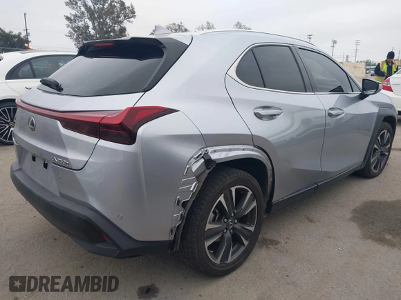 2023 Lexus UX 250h with VIN JTHX6JBH6P2143926, listed as a IAAI auction lot 42180779 with 65,106 mi miles and . Bid and sale history available at DreamBid. Image 4.