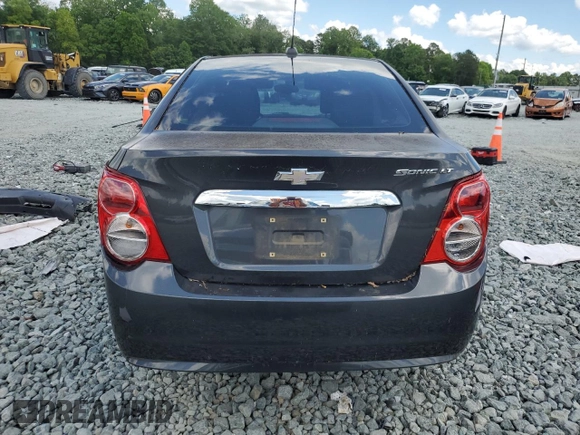 2016 Chevrolet Sonic LT with VIN 1G1JC5SH4G4119418, listed as a Copart auction lot 55809185 with 97,740 mi miles and Salvage title. Bid and sale history available at DreamBid. Image 6.
