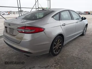2017 Ford Fusion SE with VIN 3FA6P0H71HR214150, listed as a IAAI auction lot 41533148 with 125,654 mi miles. Bid and sale history available at carsss.com. Image 4.